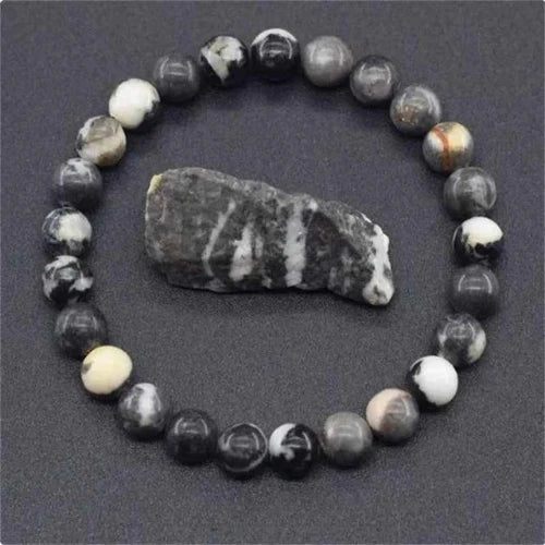 Roxana - Tiikerinsilmärannekoru, Suojelun Symboli